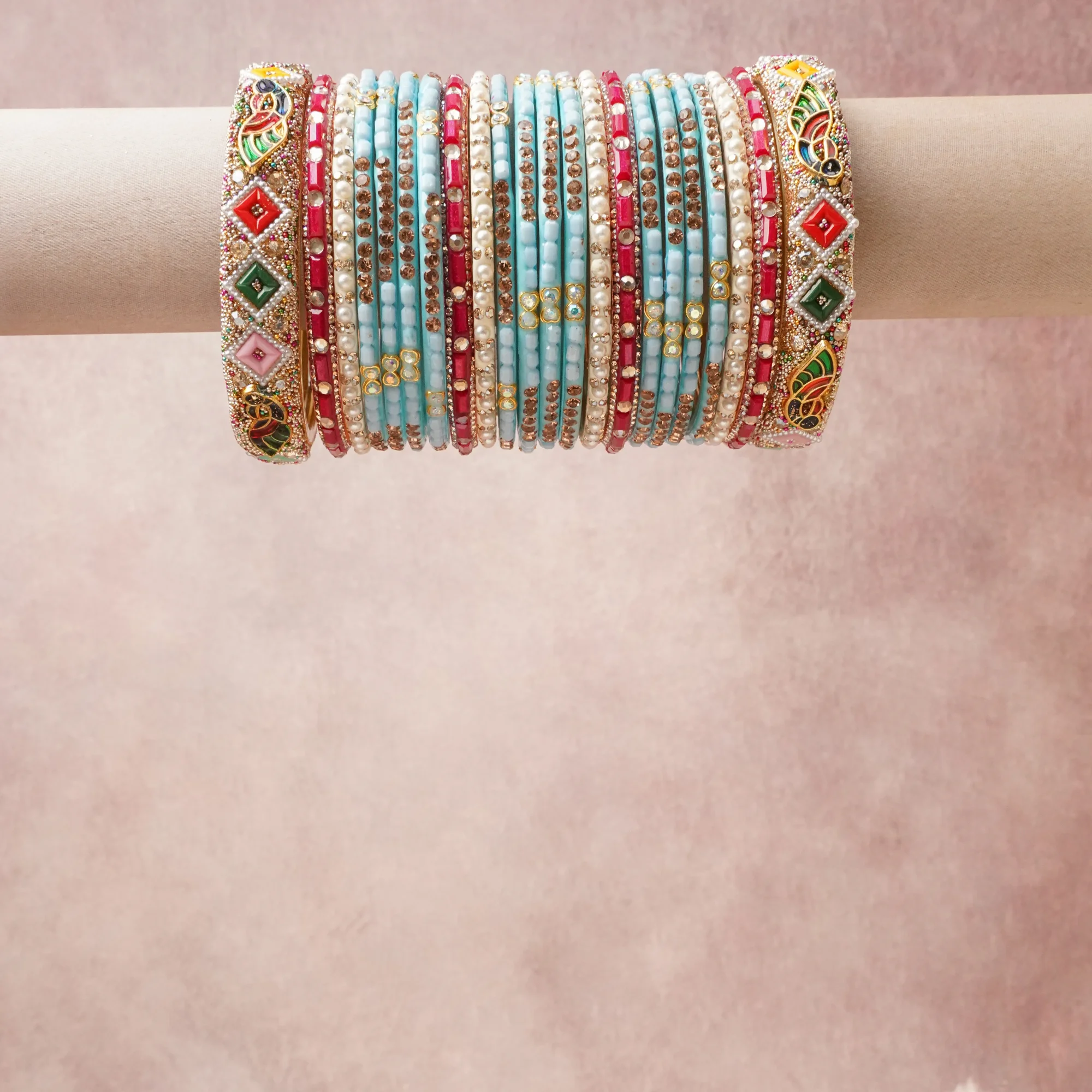 A grounding Teal Blue forms the heart of the set, while touches of Crimson Red, Pearl White, Antique Gold, Emerald Green, Canary Yellow, Hot Pink, Royal Blue, Clear add charm.

A thoughtful composition of Glass/Resin, Metal Alloy, Faux Pearls, Rhinestones, Enamel, designed to feel complete without being heavy.
Each element layers seamlessly, creating a look that is refined, wearable and quietly striking.